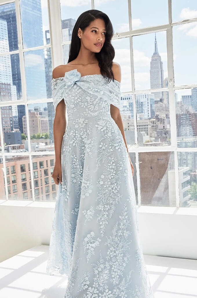 Model wearing a mothers collection gown